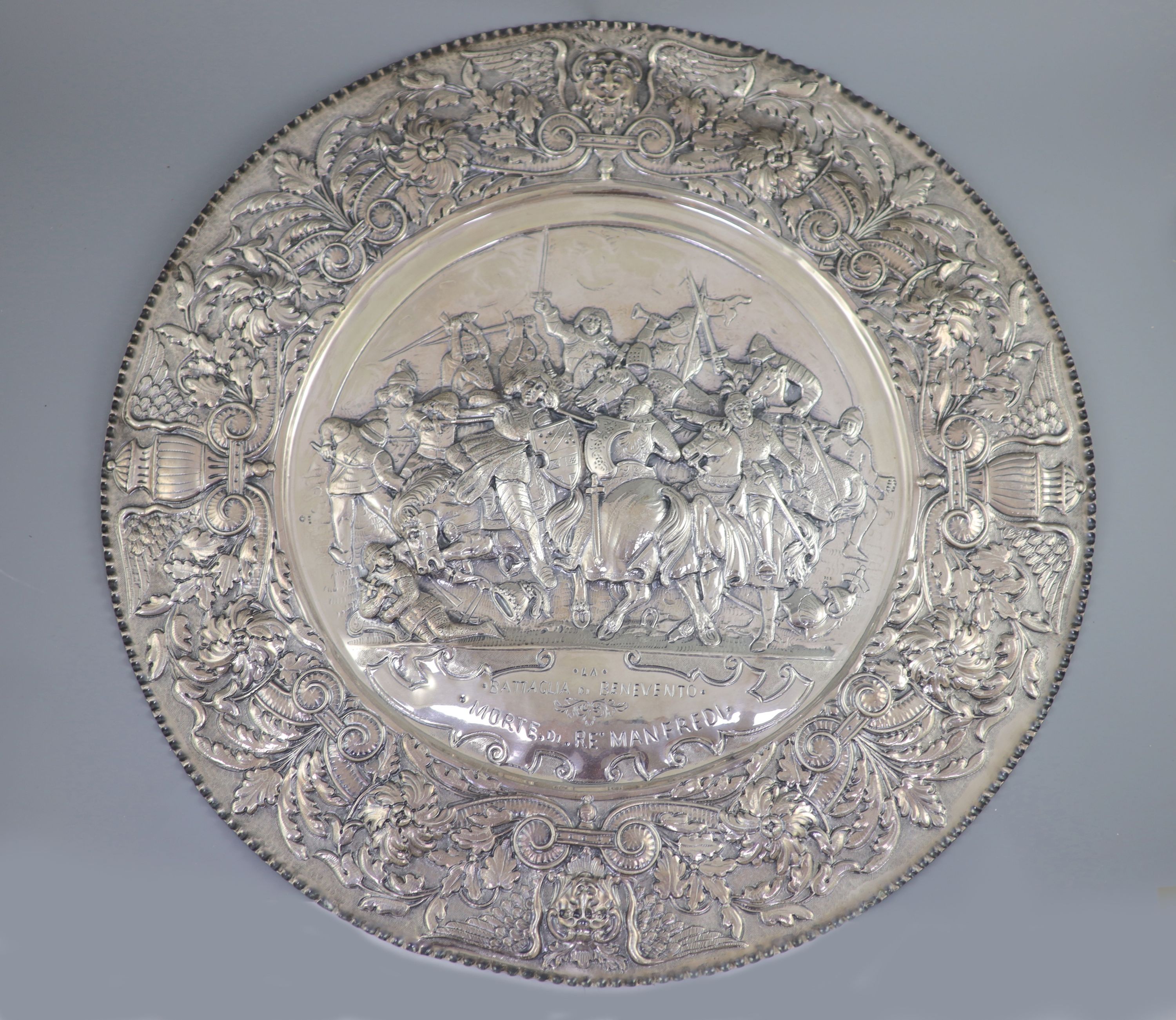 A large late 19th century Italian repousse 800 standard silver charger